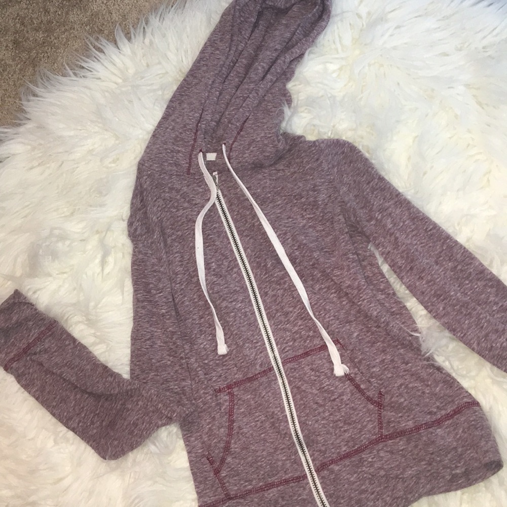 A burgundy women’s sweatshirt.